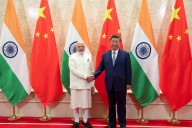 India’s Modi pledges to improve ties with China at summit hosted by Xi
