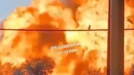 Terrifying moment petrol station erupts in huge explosion killing four after fire broke out as locals evacuated