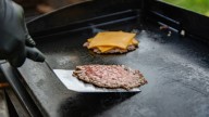 Make Smash Burgers Extra Juicy With One Canned Ingredient