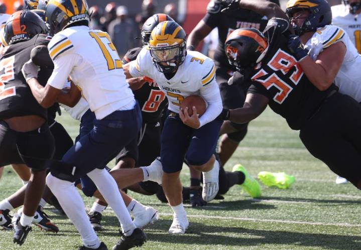 Photo gallery of Clarkston vs. Belleville football in the 20th Amazon Prep Kickoff Classic