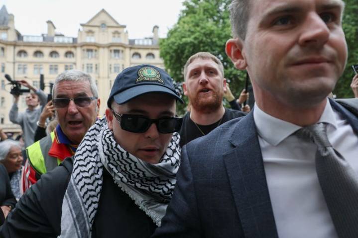 Member of Irish rap group Kneecap appears at UK court on terrorism charge