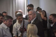 Israeli strikes kill journalists and aid-seekers as Australia backs Palestinian statehood