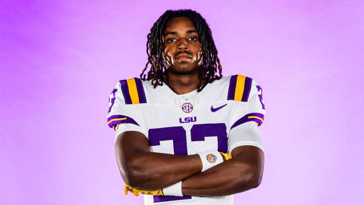LSU college football star arrested after allegedly harboring two murder suspects in his dorm