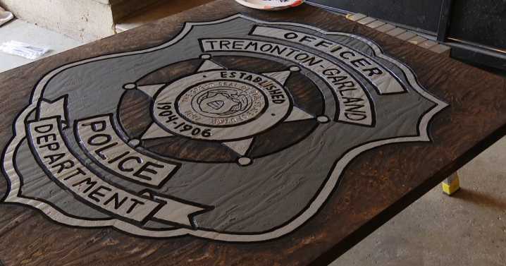 Utah carpenter honors fallen officers with wooden badges to accompany caskets