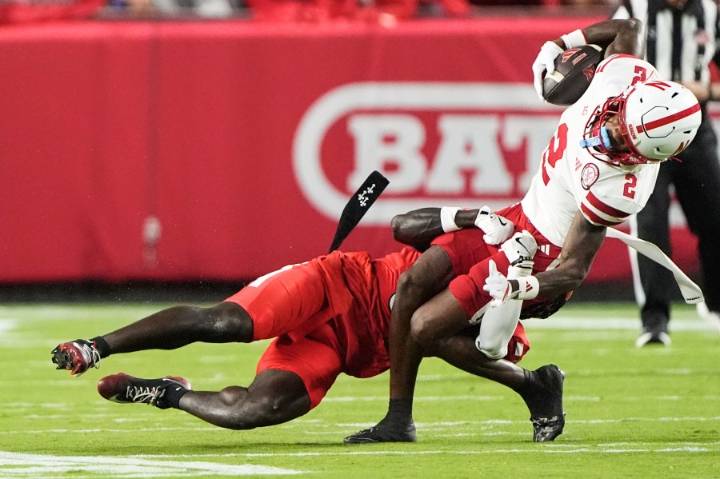 Nebraska holds off Cincinnati with late interception for 20