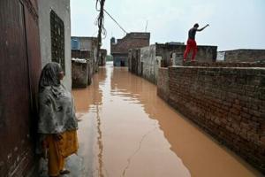 Smog then floods: Pakistani families ‘can’t catch a break’
