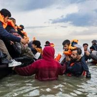 UK sees record asylum claims as row brews over housing