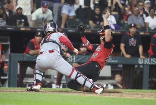 Lewis hits grand slam as Twins hand White Sox their third straight loss