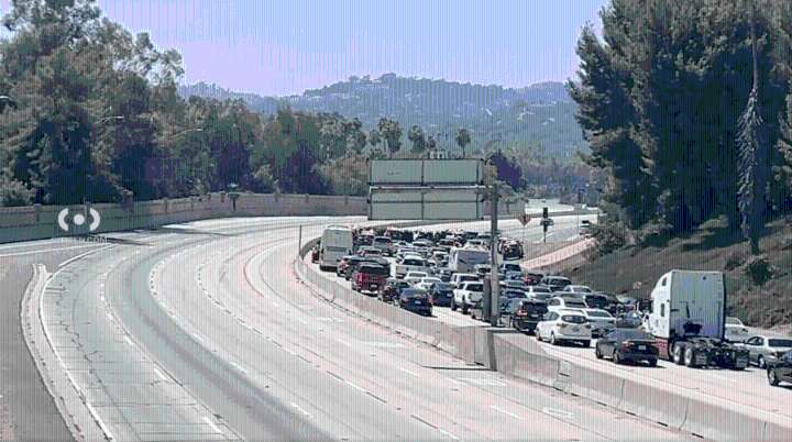 Pursuit termination halts all traffic on 405 Freeway; suspect in custody 