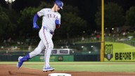 Rangers power past Athletics with home runs from Heim and Helman