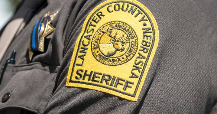 Lincoln woman hospitalized after crashing involving Lancaster County sheriff's deputy