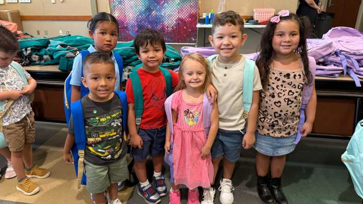 Walter Clark Legal Group donates 4,420 backpacks with school supplies