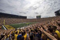 Michigan, Moore face NCAA fines