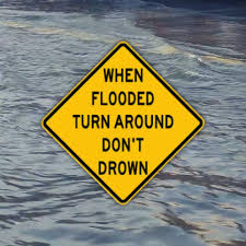 Vehicles stuck in floodwaters as heavy rains inundate and damage Lawrence County roads