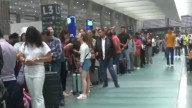 Cientos de Pasajeros Quedan Varados en AICM tras Histórica Tormenta CDMX: Aerolíneas Dan Aviso