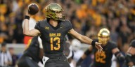 QB Jackson Arnold runs for 137 yards and 2 TDs in Auburn debut for a 38
