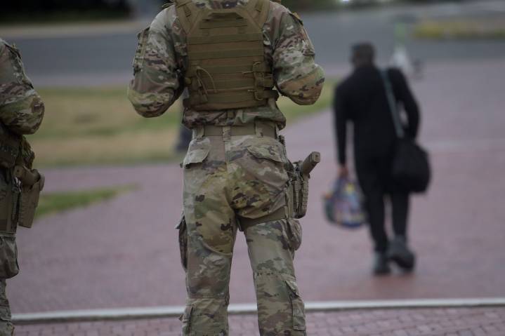 Some Guard units in Washington are now carrying firearms, Pentagon says. Trump targets more cities