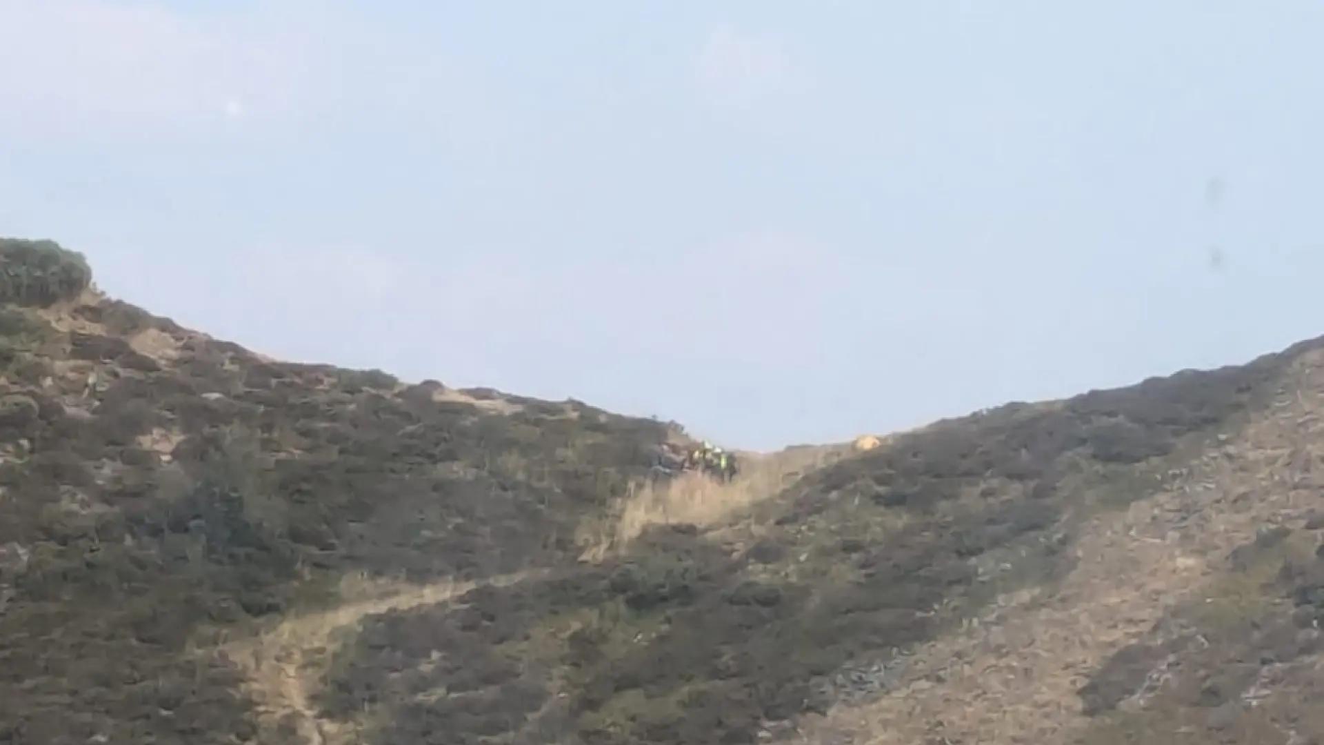 Rescatada una voluntaria en los incendios al desmayarse en el monte Catoute