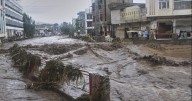 Flash floods triggered by torrential rains kill over 200 people in India and Pakistan