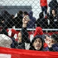 Ten hurt, 90 arrested as match abandoned following fan violence in Argentina