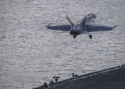 Pilot rescued after U.S. fighter jet crashes off coast of Virginia