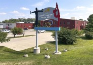 Years after abuse reports, ex-coach at renowned U.S. gymnastics academy is arrested by FBI