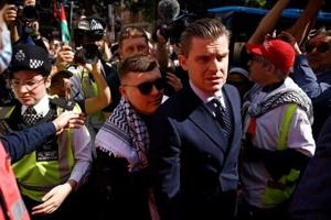 Kneecap rapper faces court on terror charge over Hezbollah flag