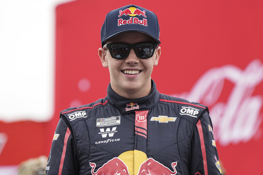 Connor Zilisch sports a smile and elbow sling at Watkins Glen a day after his nasty fall