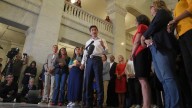 Democrats and advocates call for gun reform, Trump administration looks elsewhere after Minneapolis shooting