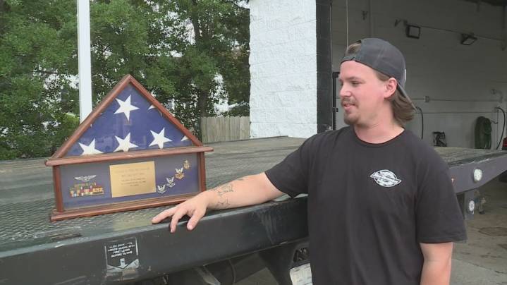 Treasured flag presented to Navy Officer found in junk car, reunited with family