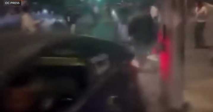 Video shows car crash into group of onlookers during Compton street takeover