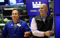 Dow notches record high as Wall Street cheers Powell’s speech