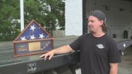Treasured flag presented to Navy Officer found in junk car, reunited with family