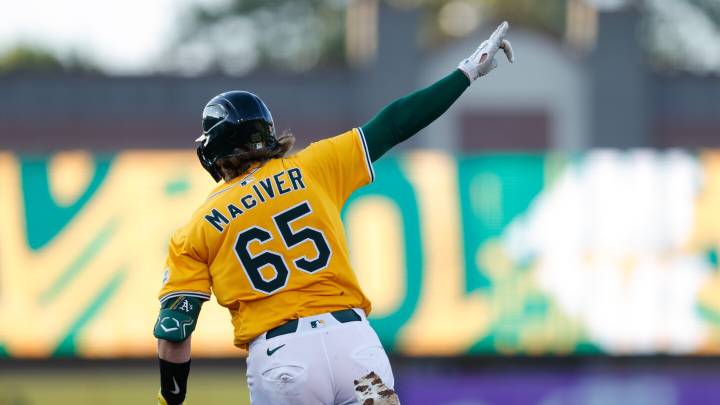 Willie MacIver hits a 2-run double in the 9th to rally Athletics over Orioles