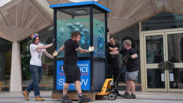 Banksy's piranhas police box put in protective storage ahead of museum display