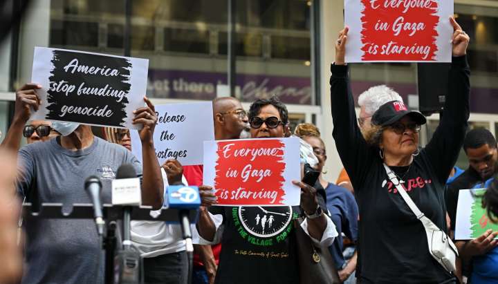 St. Sabina parishioners lead prayers outside Israeli consulate against starvation in Gaza, U.S. aid for war
