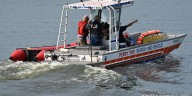 Local fire departments team up for water rescue training on Ohio River