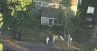 Man and woman dead in shooting at Raynham home, 2 children unharmed