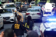 ‘Militarization of politics’: How bucolic Bethesda woke up to FBI search on John Bolton