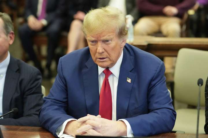 Appeals court throws out massive civil fraud penalty against President Donald Trump