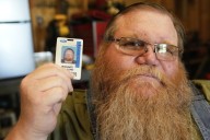 A Michigan autoworker’s wallet is found under a hood in Minnesota
