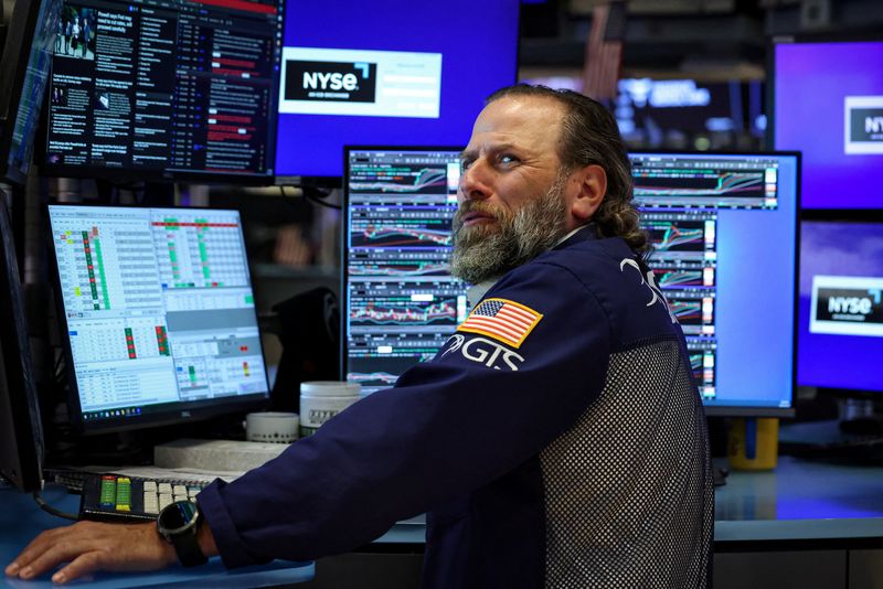 Trading Day: Fed hopes lift stocks, clip dollar