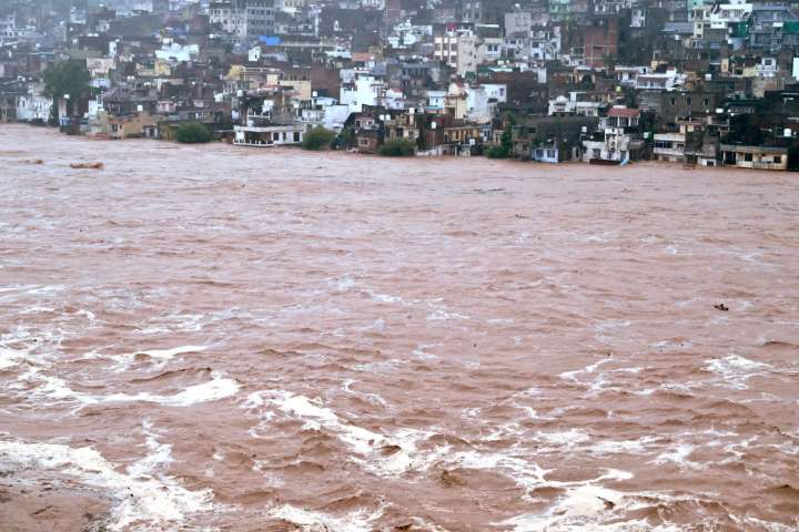 Flash flooding and landslides kill at least 34 in Indian