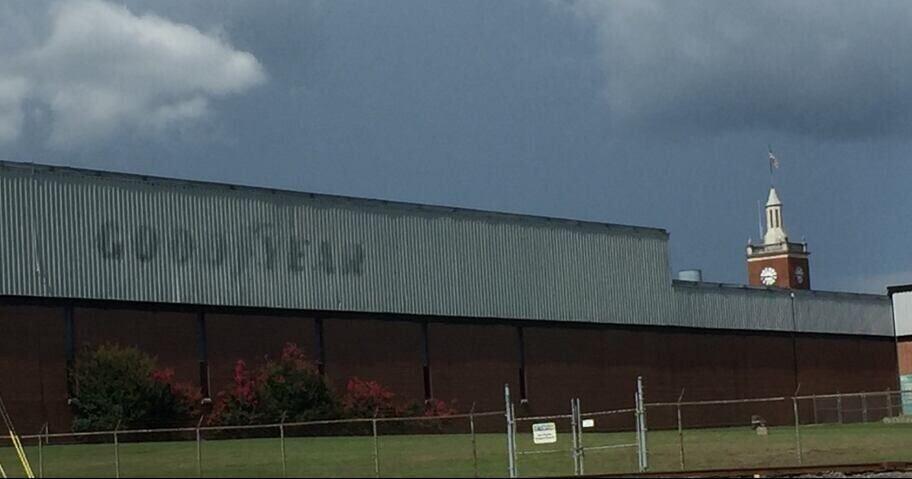 Why are trucks showing up at abandoned Alabama industrial plant that was world’s largest tire producer?