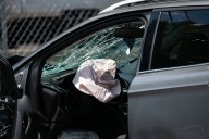 Driver of car that hurtled through intersection, over sidewalk in NE Portland, killing pedestrian, dies of injuries