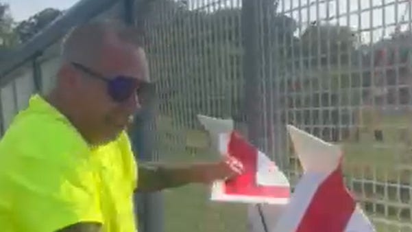 Man who allegedly tore down anti-Trump signs charged with assault