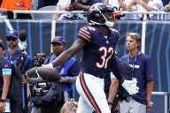 Bears DB Terell Smith carted off with knee injury