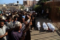New Israeli strikes kill Palestinians seeking food aid, as Israel denounces famine declaration