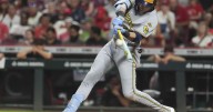 Yelich hits 2 HRs as MLB-best Brewers rally past Reds 10-8, tie club record with 13th straight win