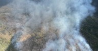 Cool weather slows fire's growth